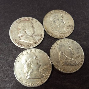 Lot of (4) 1949 Franklin Half Dollars 90% Silver