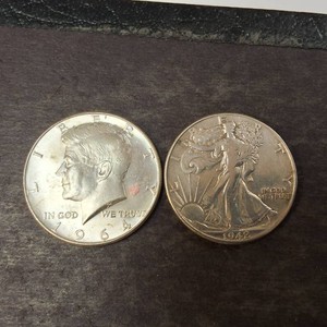 Guy and Gal 90% Silver half dollars 1964 & 1942