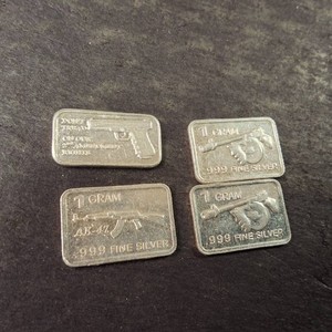 Lot of (4) 1 gram bars of .999 fine (pure) silver guns, guns, & guns