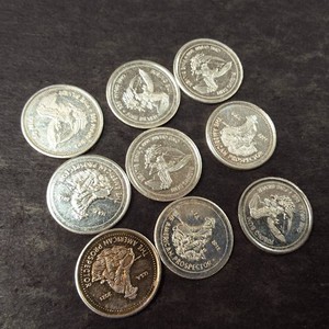 Lot of (9) 1 gram rounds of .999 fine (pure) silver Prospector and Eagles
