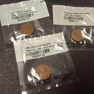 Three sealed Wheat Pennies - 2 of them are LHC Shell Casings