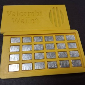 Nice Yellow Full Valcambi Wallet with (24) One Gram .999 Silver Bars