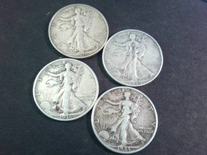 Lot of (4) Early mixed years Walking Liberty Half Dollars  (90% Silver content) Circulated Coins