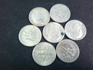 Lot of (7) Roosevelt dimes minted from 1946 through 1964 contain 90% silver and 10% copper