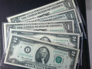 Mixed lot of $1 and $2 FRN in pristine, sealed condition Lot of (5)