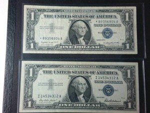 Lot of (2) $1 Silver Certificates, the Series A note is a star note