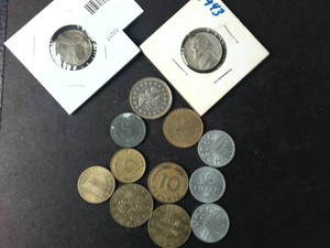 Mixed lot of several foreign coins (1916 English)  War Nickel bonus (1943) 35% silver