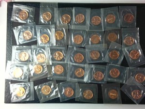Lot of (34) Pristine UNC Sealed in tabs Red Cents - from the 1960s