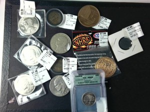 Grab bag of mixed coins  Includes 1999-D MS 65 Connecticut Quarter and Eisenhower Dollars