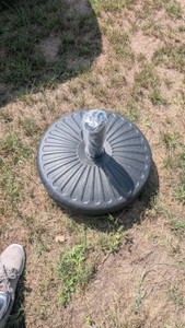 medium sized water filled umbrella base with post