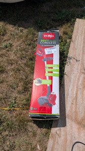 New openbox return slightly used. tested working 20 volt Toro weed trimmer edger