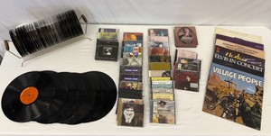 Large Lot of Vinyl Records & CDs Including Village People, Elvis Presley, The Beach Boys, Robin Thicke, Kenny Rogers & More