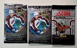 3 Packs of Hockey Cards (2 2022-23 Metal Universe & 1 2011 Score)