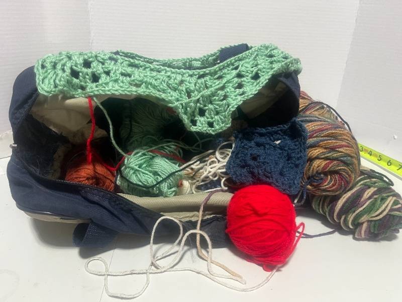 Bag of Yarn and Crocheted Items