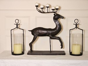 Brutalist Metal Reindeer Candle Holder Accompanied by Two Candle Dcor Lanterns