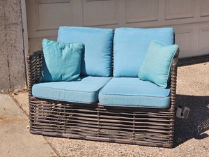 Dark Brown Wicker Patio Barrel Back Loveseat with Blue Cushions