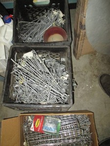 Peg hooks and other metal store fixture accessories