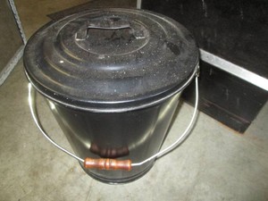 Metal pail with wood handled lid