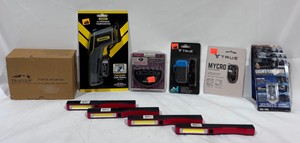 Large Lot of Outdoor Items Traeger Power Inverter, Infrared Thermometer, Cap Light, Plasma Lighter, Knife Sharpener, Adhesive LED Lights, Utility Lights