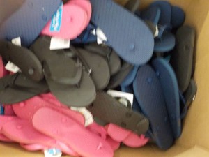 Large box of Summer Overstock Sandals and Glasses