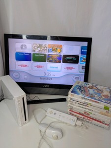 Nintendo WiiTV Lot- Vizio 22 TV, Nintendo Wii with Remote Controller and Nunchuck set, 9 Wii Games- all working condition