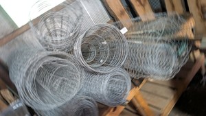 Large lot of chicken wire and tomato cages as shown