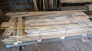 pallet of construction millwork hardwood oak lumber. custom cabinetry large lot here the largest drying inside