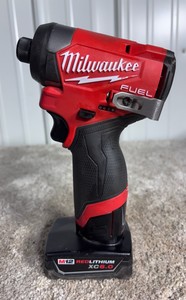 Milwaukee M12 FUEL Lithium-Ion Brushless Cordless 14 in. Hex Impact Driver wBattery and charger