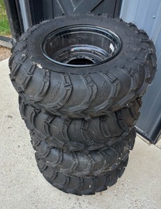 Lot of 4 ITP Mud Lite ATVUTV Tires on Standard OEM Black Steel Rims