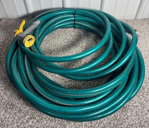 100ft Vinyl 58in Garden Hose with Nozzle Attachment