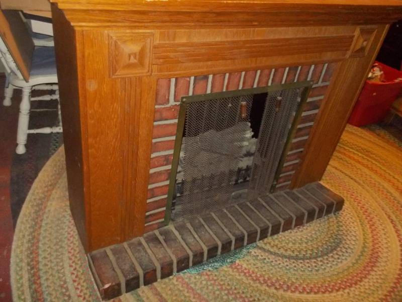 Vintage-Style Wooden Fireplace Mantel with Faux Brick Trim