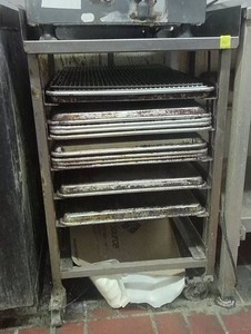 METAL BAKERY RACK WITH 11 PANS AND 3 RACKS