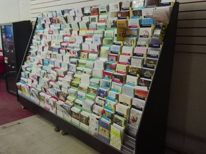 LARGE ROLLING CARD RACKS FULL OF CARDS FOR ALL OCCASIONS