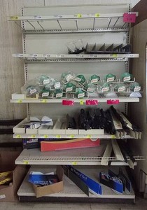METAL SHELF FILLED WITH PLASTIC DIVIDERS