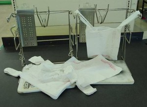 2 METAL BAG HOLDERS