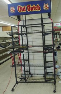 OLD DUTCH DISPLAY RACK ON CASTOR WHEELS