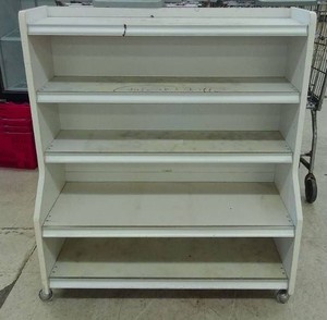 SMALL DISPLAY SHELF ON CASTORS