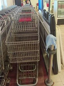 ROW OF 12 GROCERY STORE CARTS