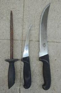 2 VICTORINOX KNIVES AND A SHARPENER