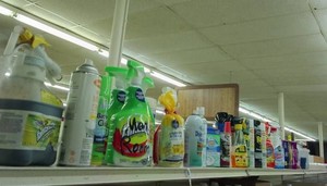 TOP SHELF FULL OF CLEANING PRODUCTS