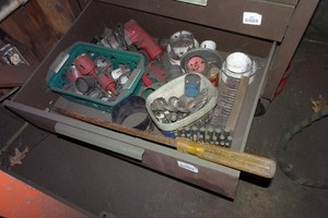 Contents of Drawer - Pry Bar, Corded Drill, Hole Saws