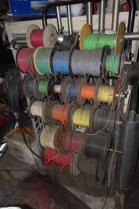Double Sided Wire Storage Rack Loaded with Automotive Wiring
