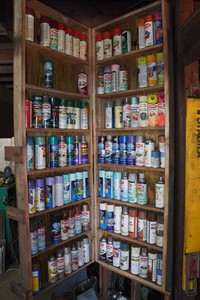 Hinged Wall Cabinet Loaded with Spray Paint
