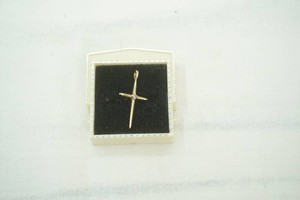 Gold cross with diamond