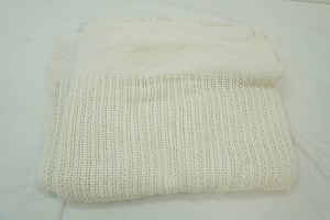 off white knitted throw blanket with ribbed border