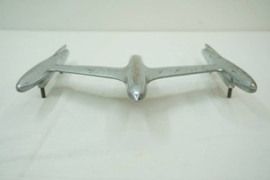 OE 1955 Oldsmobile 88 Jet Rocket chrome hood ornament. This is a nice solid piece with no rust but slight scratches. Part # 566355