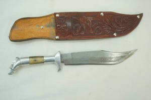 vintage Mexican Oaxaca Bowie Knife 10 blade with Eagle Head handle and leather sheath. Translation of etching on blade If this snake bites you, there is no remedy in the pharmacy