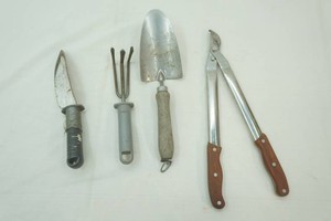 garden tools including spades, fork, snipper