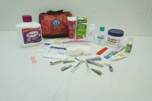 first aid kit, Mira Lax, Robitussin, Aquaphor healing ointment, finger nail clippers and more
