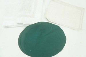 2 small rugs, 2 different style cloth placemats
